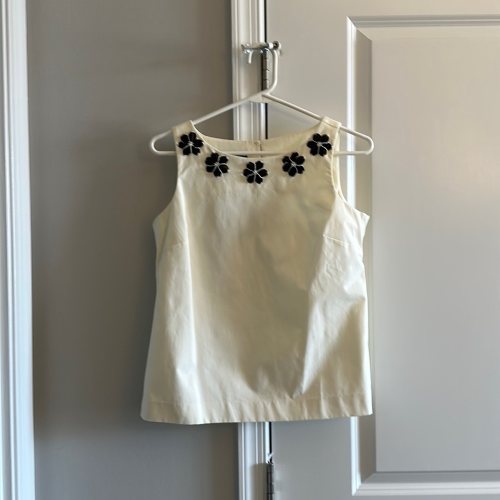 NWT cream shell top with beaded neckline